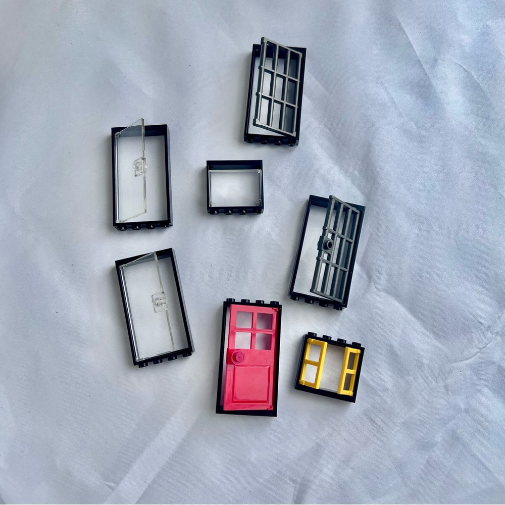 LEGO Toy Door and Window Pieces - Black Frames with Red, Yellow and Clear